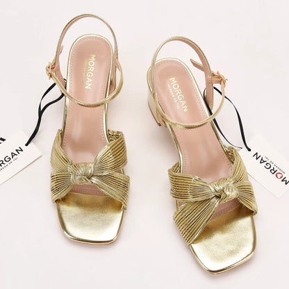 Sandales dorées à nœud – Élégance lumineuse & féminité